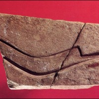 Forma di fusione in pietra arenaria per coltello. Da un abitato dell’età del bronzo finale.
